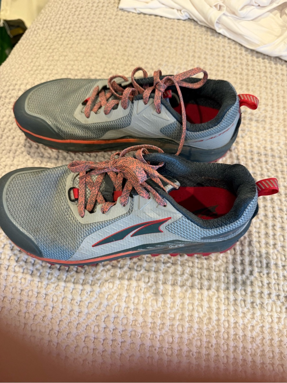 Altra woman’s  Gray and Red Lace-Up Trail Sneakers